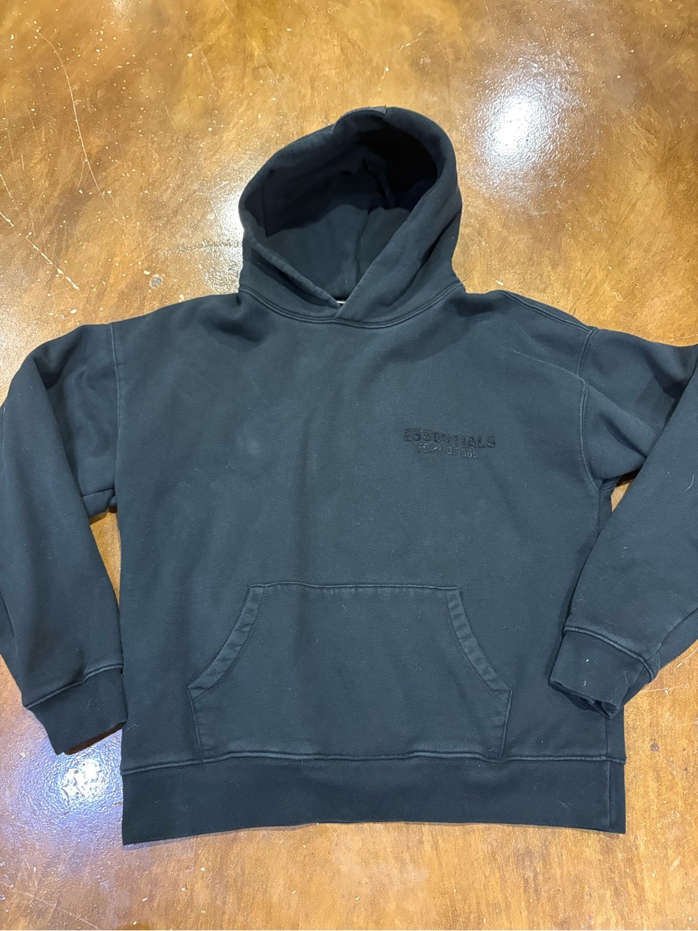 ESSENTIALS Black Pullover Hoodie with Subtle Chest Logo